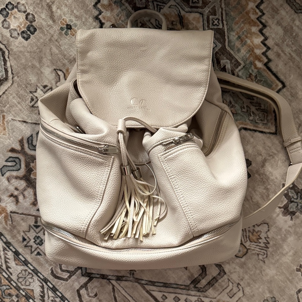 Pebbled Cream Drawstring Backpack With Tassel Det… - image 1